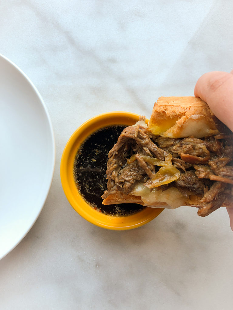 Mississippi Drip Beef Sandwiches dipping