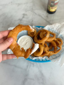 Gluten Free Beer-Battered Onion Rings dipped in ranch